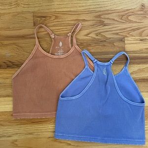 Two Free people movement crop tanks